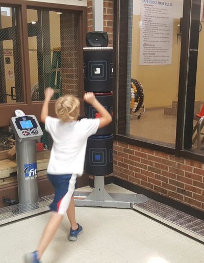 Boy uses 3-kick interactive system