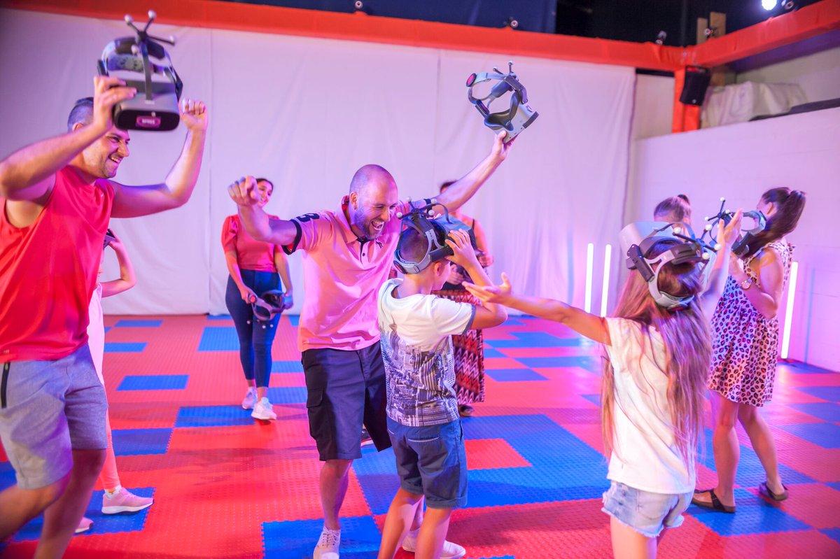 Parents and Kids play SPREE Arena Interactive VR Game