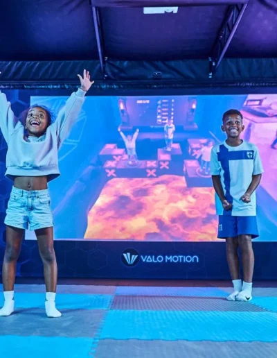 young kids play valoarena mixed reality game